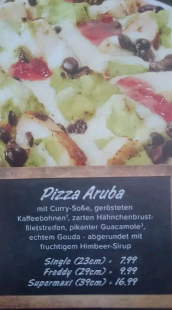 Pizza with curry sauce, coffee beans, guacamole, and raspberry syrup. Germany, never change.
