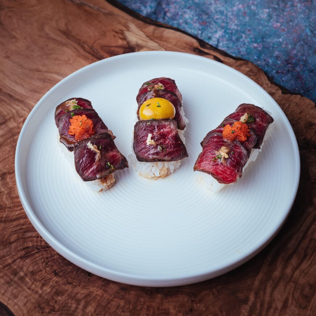 Steak, eggs, and rice.