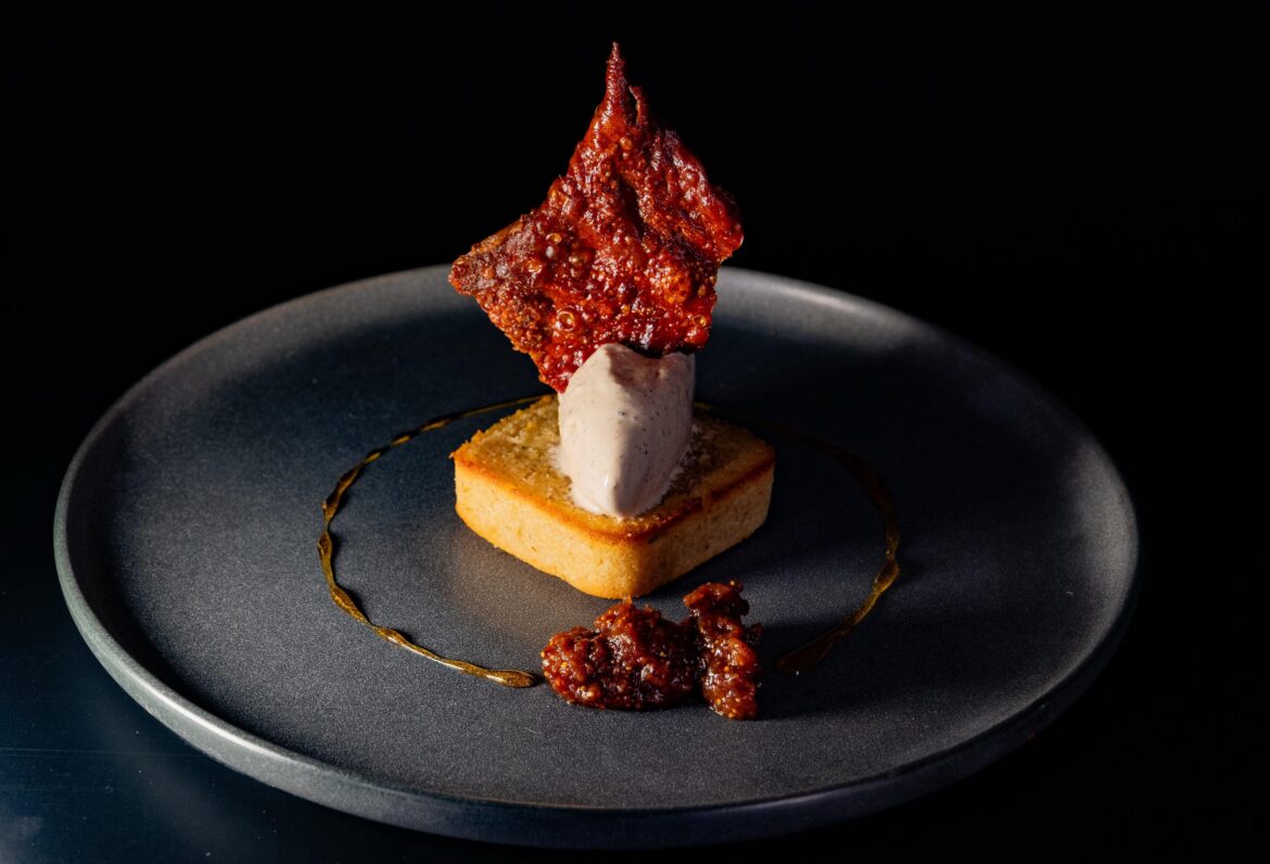 Foie gras ice cream, burnt honey gastrique, smoked fig compote, crispy chicken skin, financier