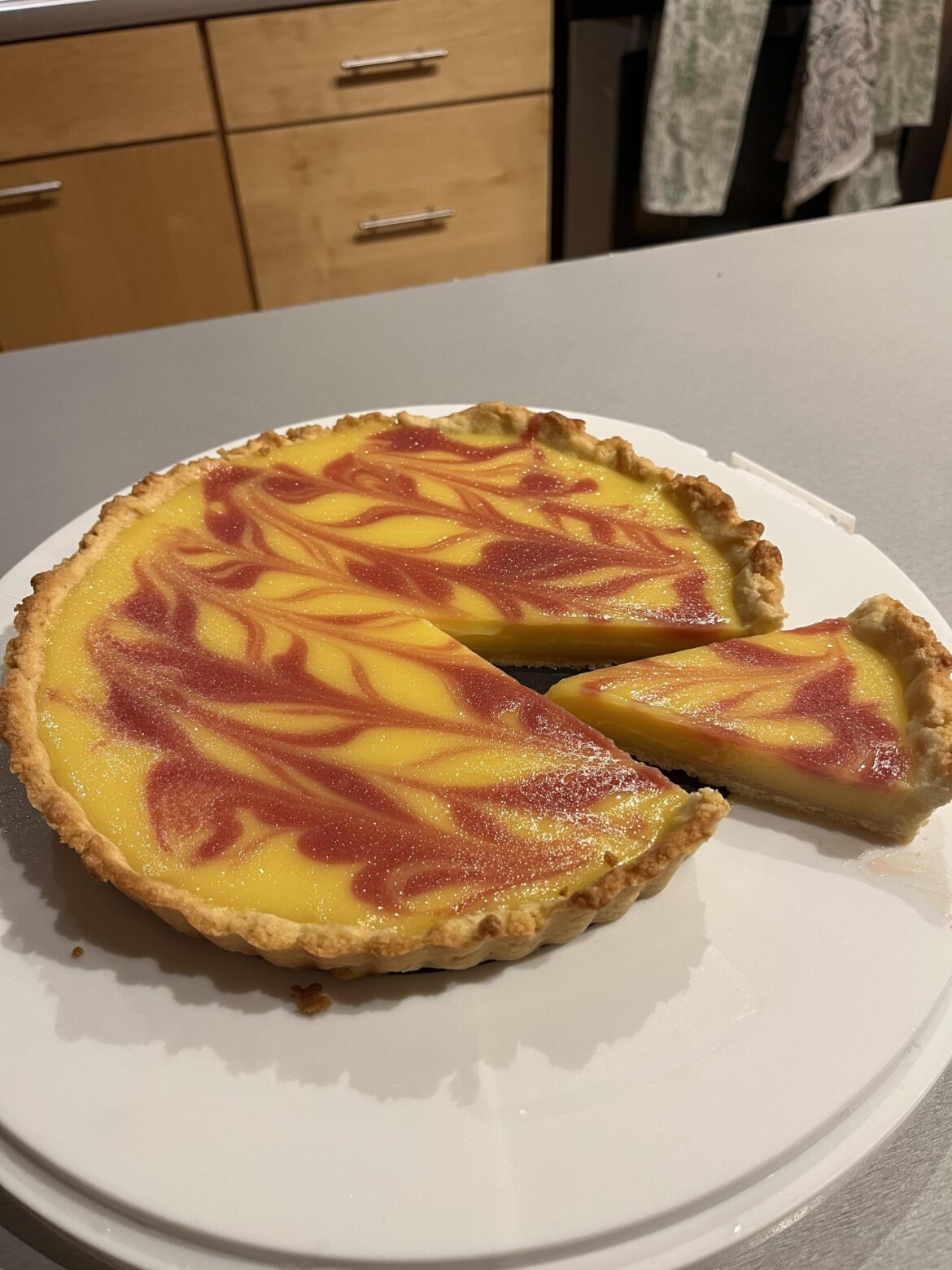 Lemon tart with a raspberry curd swirl I made last week ☺️