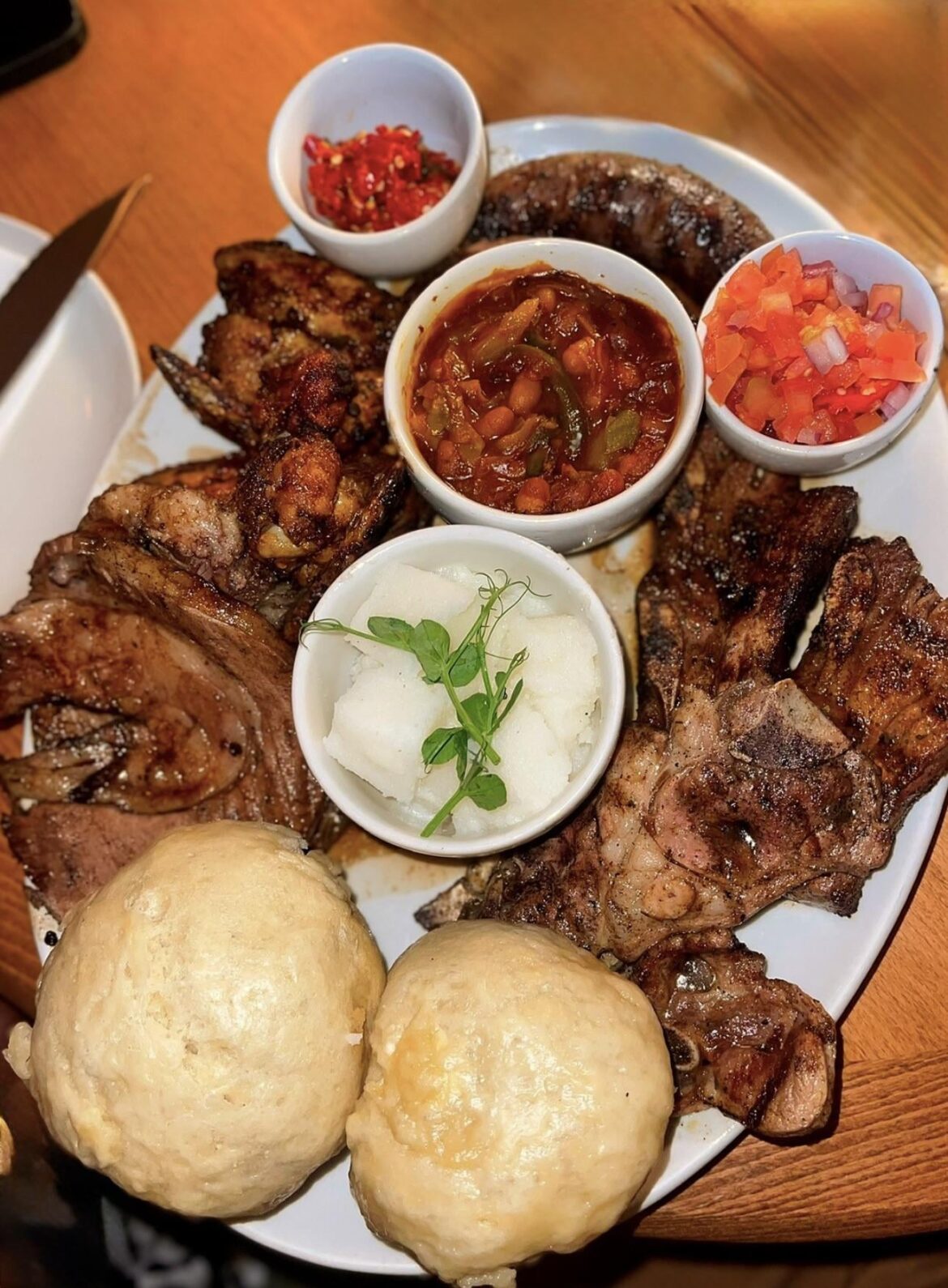 Braai meat platter and steamed bread.