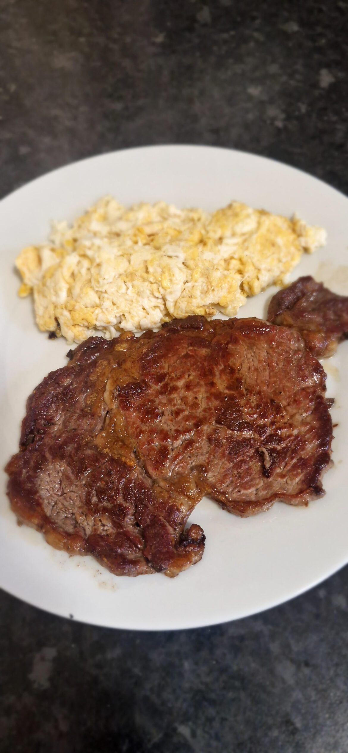 Ribeye, 3 eggs cooked in half a tspn of ghee butter and the fat from the ribeye.