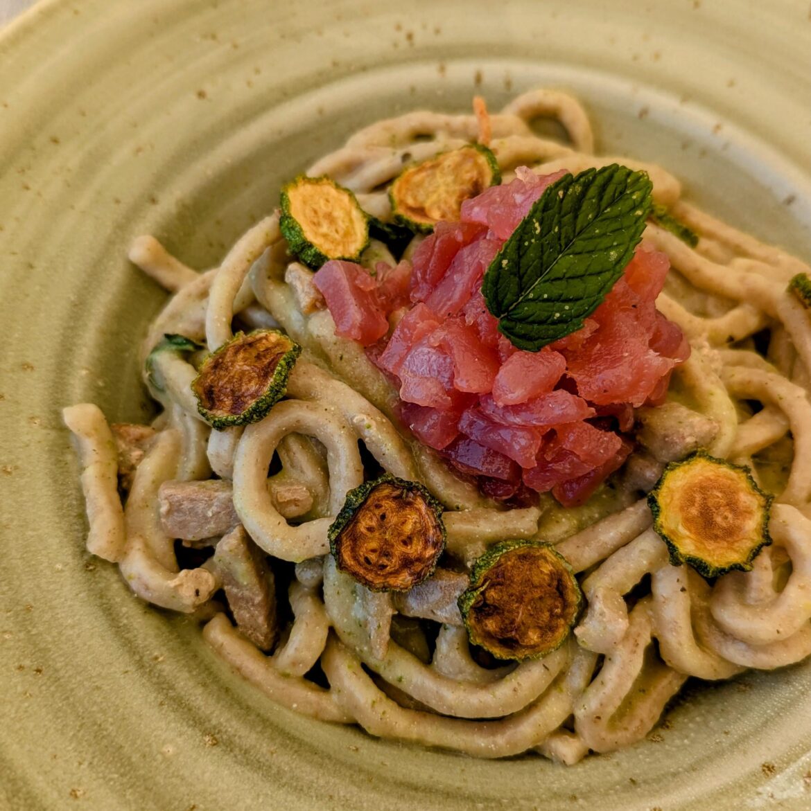 Wholewheat fresh pasta (torvicelli) with romanesco courgettes and fresh tuna (raw and cooked)