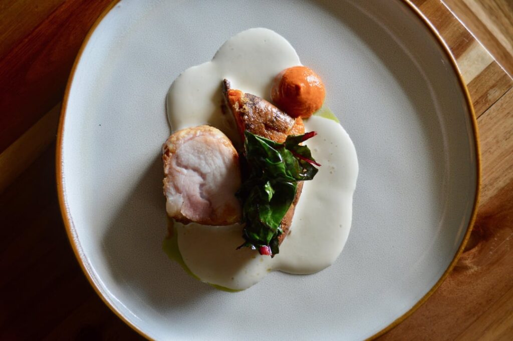 Pork Loin, Brown Butter Sweet Potato, Swiss Chard, Peanut Romesco, Gin & Juniper Pork Loin, Brown Butter Sweet Potato, Swiss Chard, Peanut Romesco, Gin & Juniper