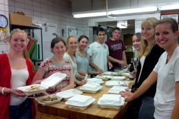 French club smiles with the meals they made with Upper Farinon’s Chef Michael.