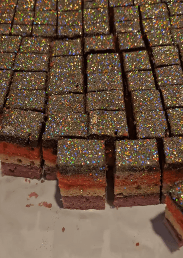 I made Rainbow Cookies for my bestie's bday, and covered them in edible glitter