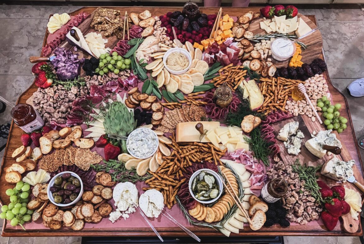 There’s 15 different cheeses on this table I assembled, not counting the 4 vegan varieties…