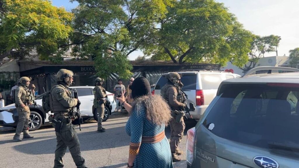 "agents stormed into the restaurant and deployed flash bang grenades to disperse crowds"  . "immediately handcuffed each employee"