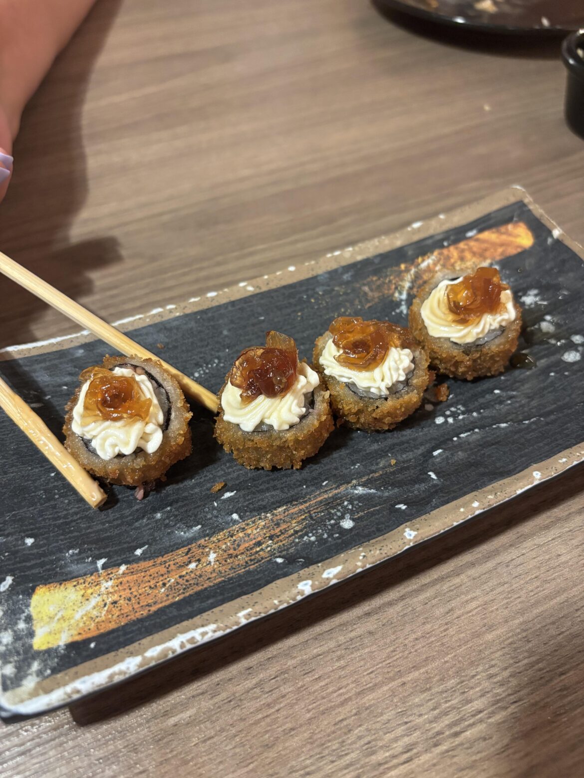 “Hot roll” consisting of cream cheese and caramelized onions… absolutely spectacular.
