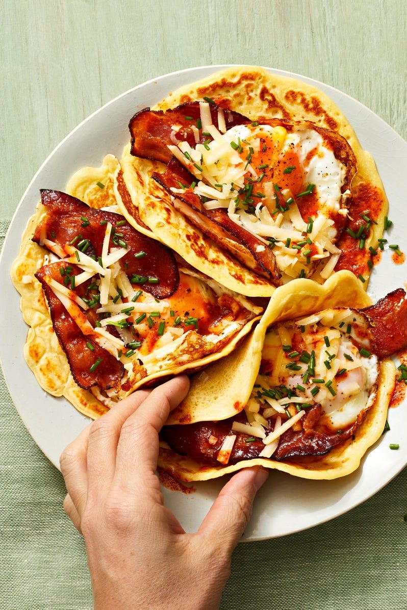Loaded Pancake Tacos pancake tacos with bacon and eggs inside