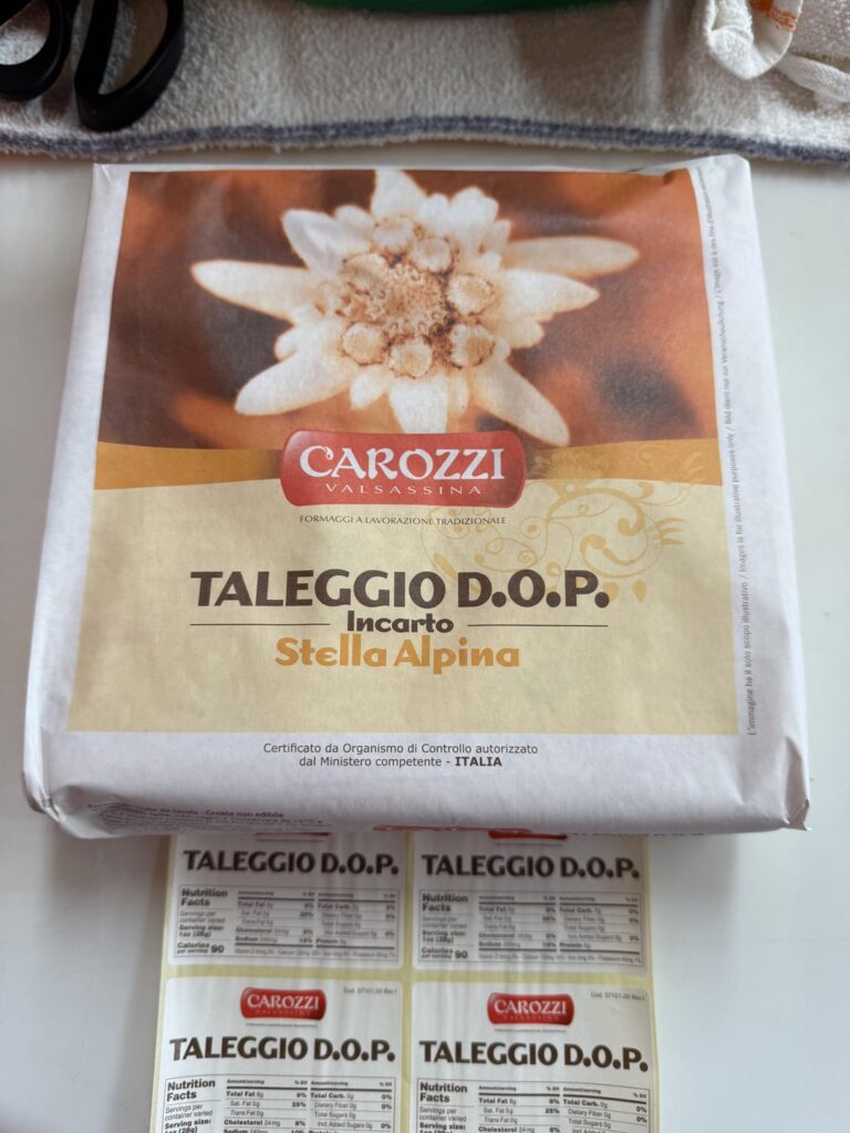 Taleggio. Excellent washed rind and cave aged cheese.