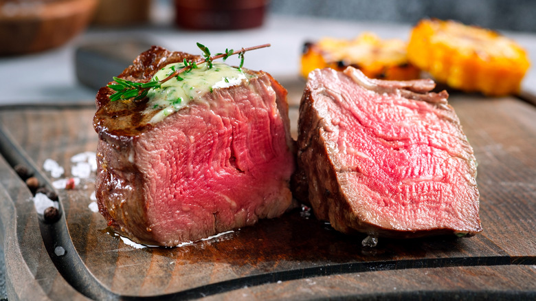 sliced Filet mignon on board
