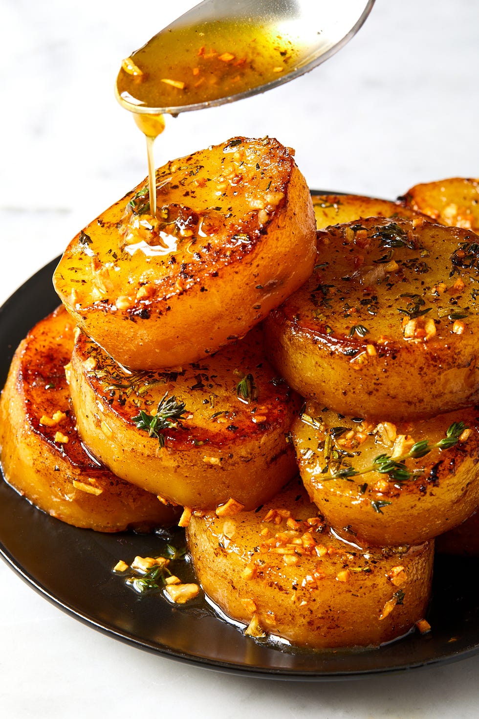 melting potatoes with herbs