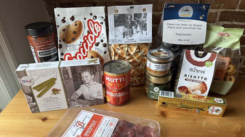 Variety of Eataly products arranged on wooden table