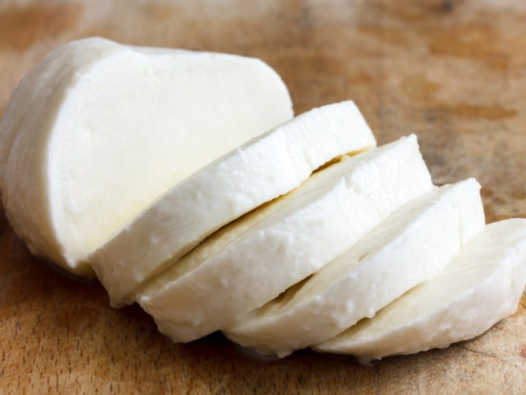 Single ball of mozzarella cheese sliced