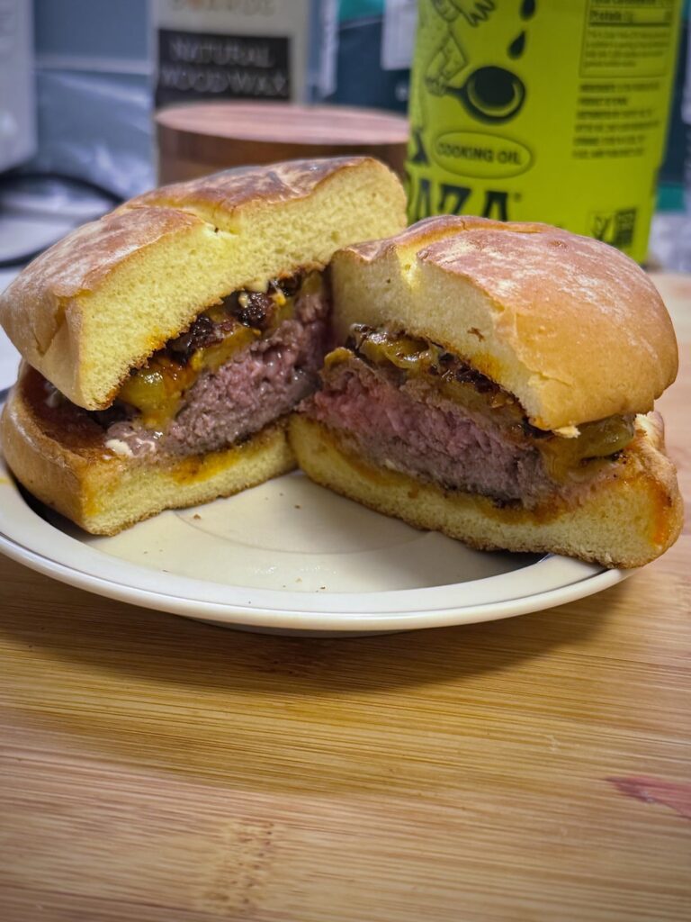 A little too drunk and hungry to take decent photos. This was fantastic. There is clearly cheese visible on this cheeseburger. Smoked Cheddar in fact.