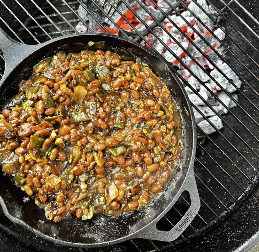 Cowboy beans, quick smoked/grilled thighs, and grilled corn. There are worse ways to live.