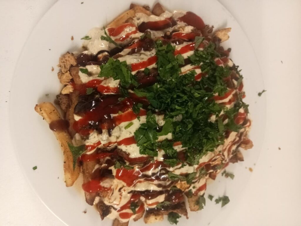 Does this belong here? Birria HSP with Consomé queso