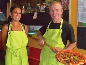 Philippe Schneider, right, and his partner, Nathalie Caboubassy. Schneider is accused of murder while Caboubassy is accused of being complicit in the crime.
