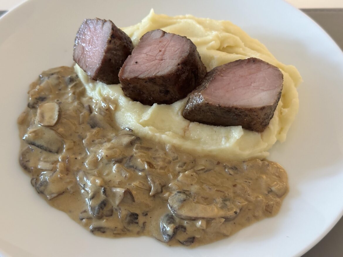 Pork fillet, mashed potato and a creamy mushroom sauce