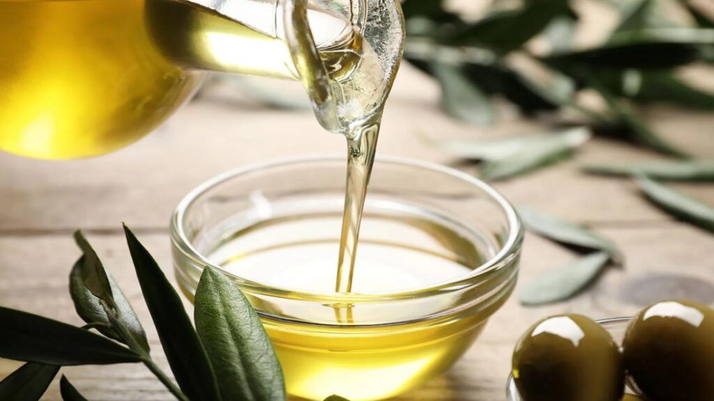 Man in shower rinsing off his face