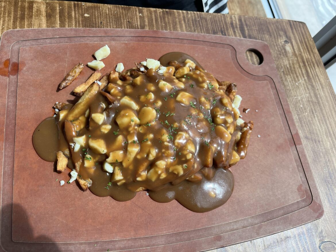 The regular poutine at Le BBQ Shop in Gatineau (xpost, not mine)