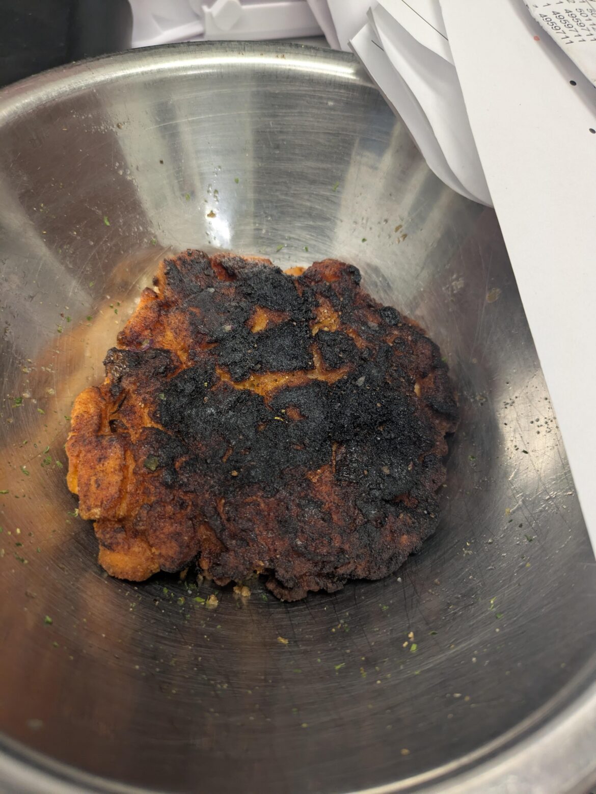 Previous lead who was demoted put this out yesterday and got mad that I told the chef about his lack of quality and care. It's a salmon burger... Or was.
