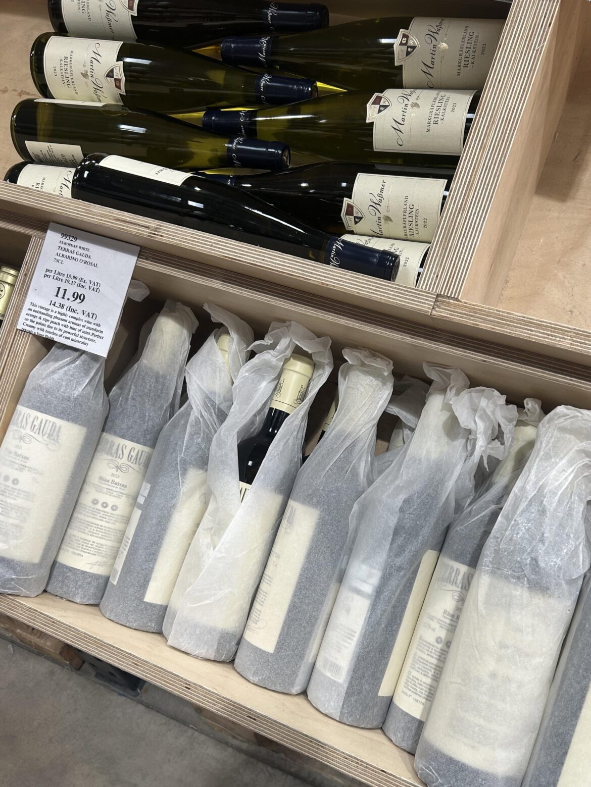 Purpose of wrapping wine in paper (at Costco)?