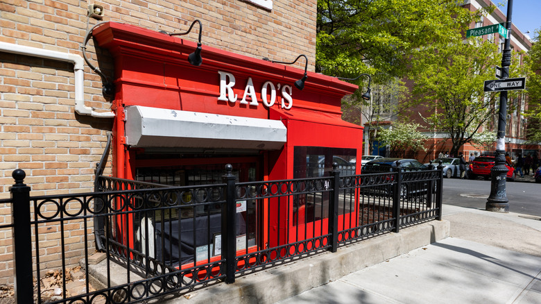 Rao's restaurant on the corner of a city street