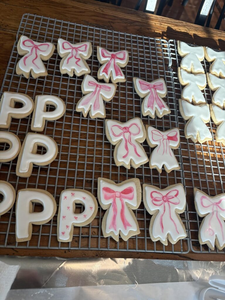 I’m really bad at royal icing but my best friend wanted bow cookies for her baby shower. Thankfully food dye is similar enough to water color!