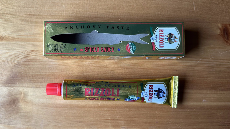Rizzoli Anchovy Paste in Spiced Sauce on wooden table