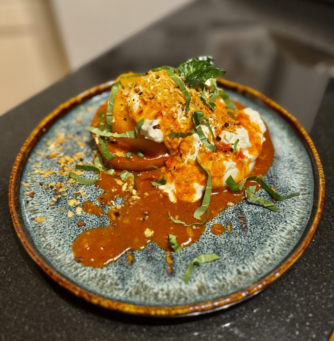 burrata caprese with gochujang vinaigrette