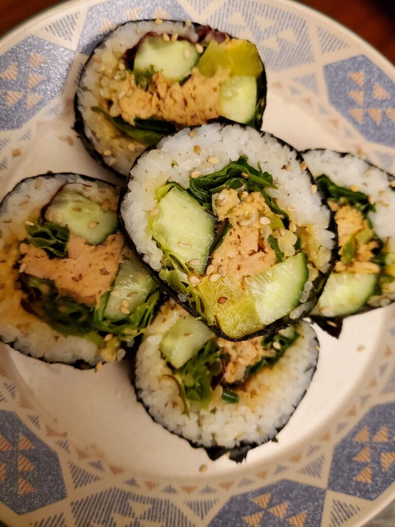 My tuna kimbap is bigger than my mouth.