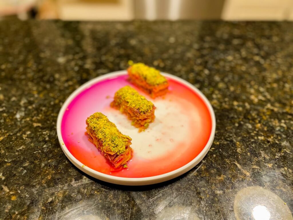 carrots with brown butter, honey, pistachio, lemon zest, and some b