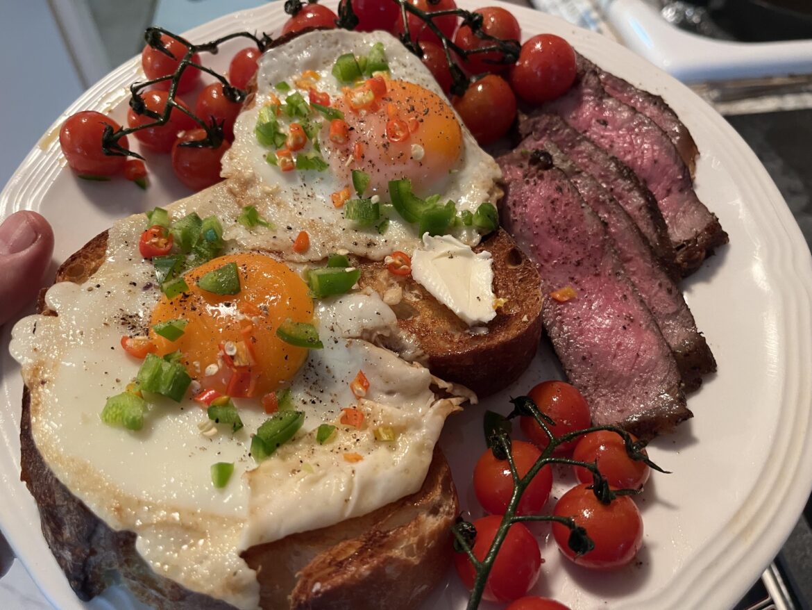 Wagyu steak and eggs over sourdough