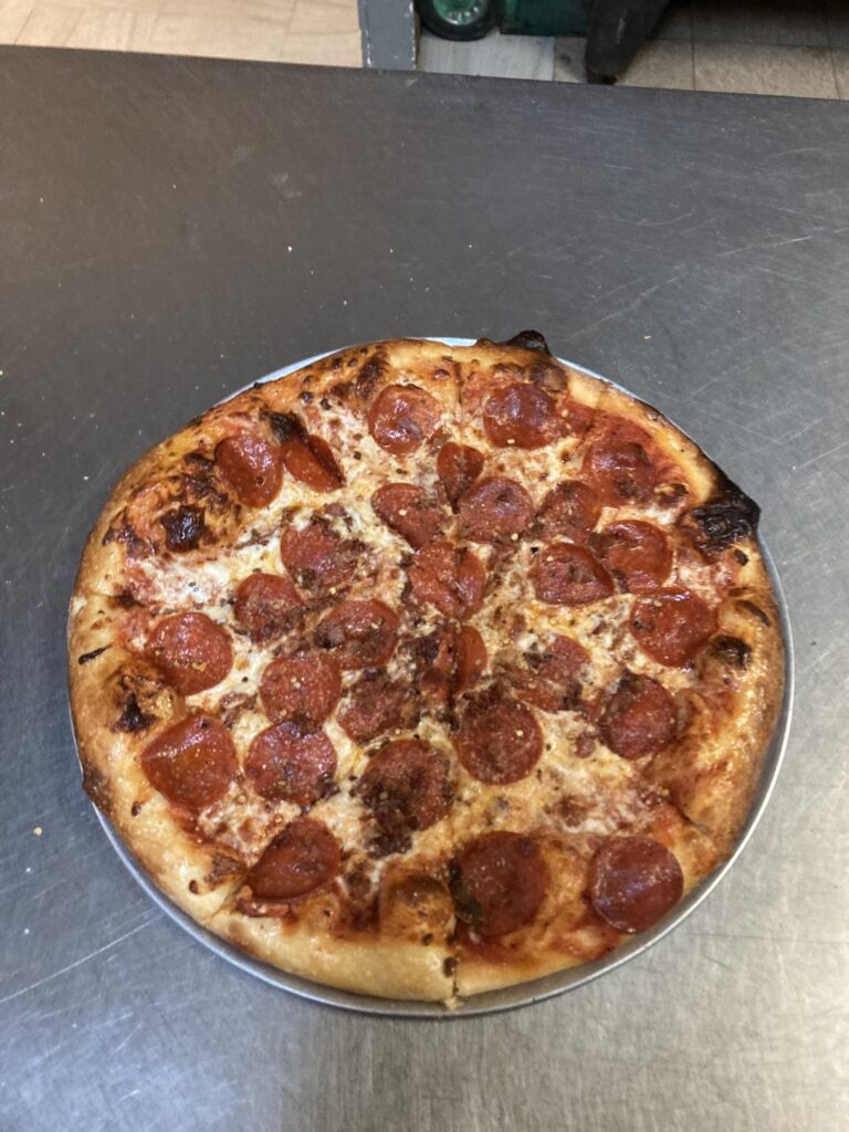 Would about 1300 calories for roughly half this pizza be accurate?