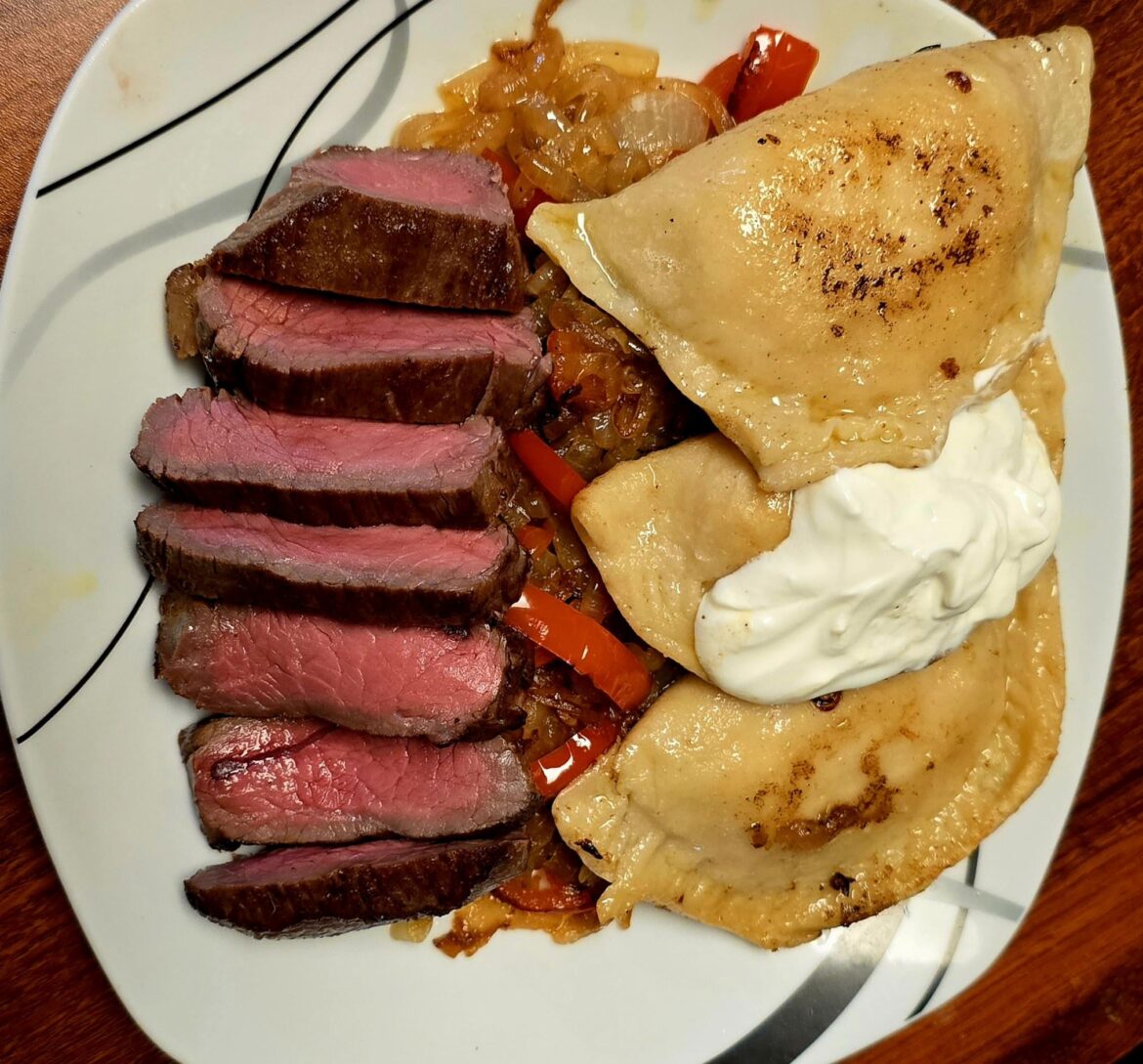 From scratch potato and cheese pierogi's and steak, served over a bed of peppers and onions sautéed in duck fat.