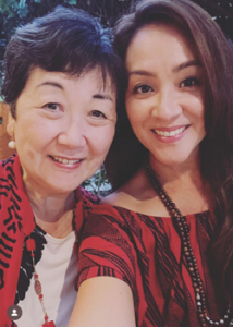 Two people smiling