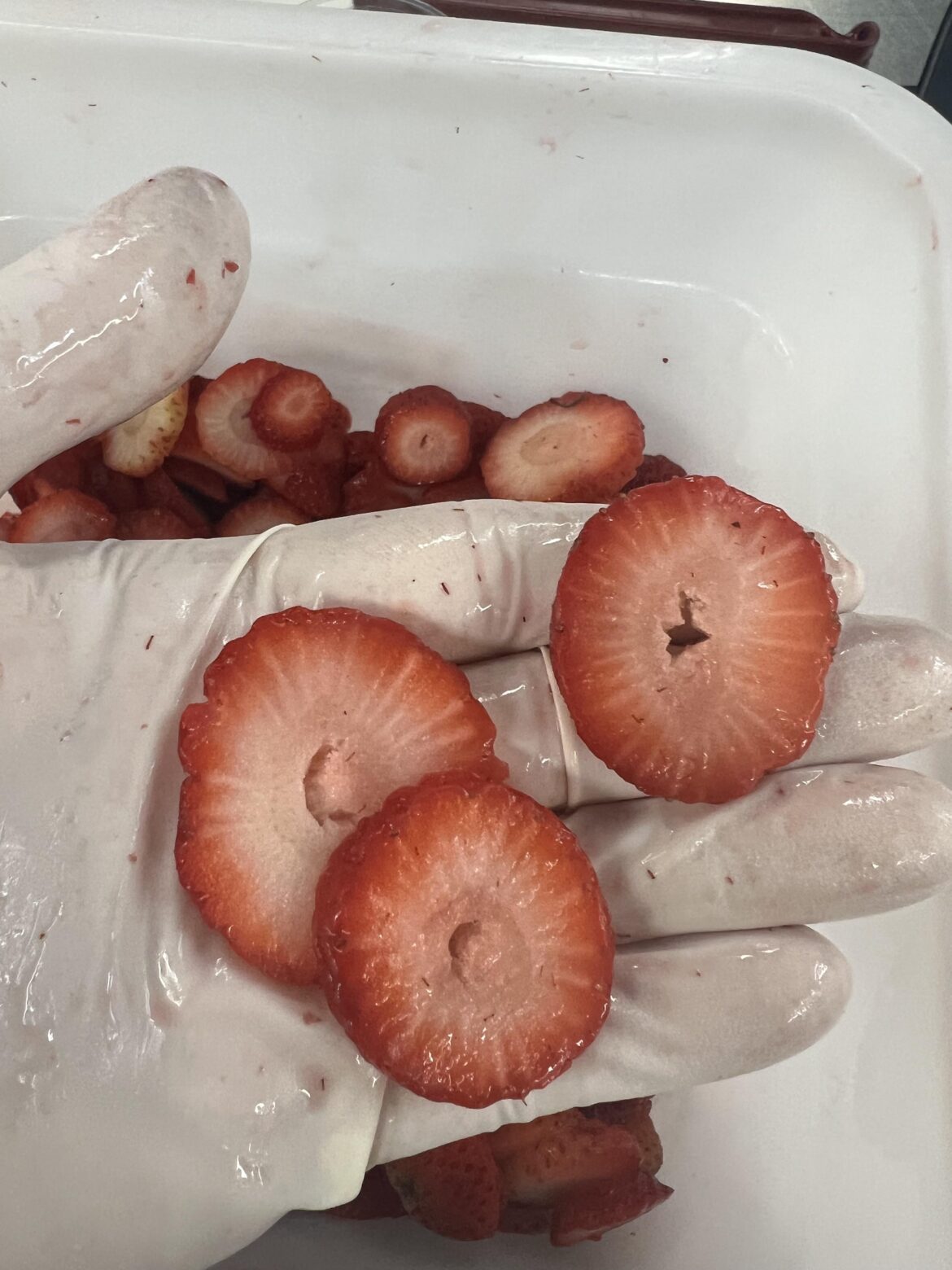 Coworker was asked to slice strawberries. Now we’ve got six quarts of anuses.