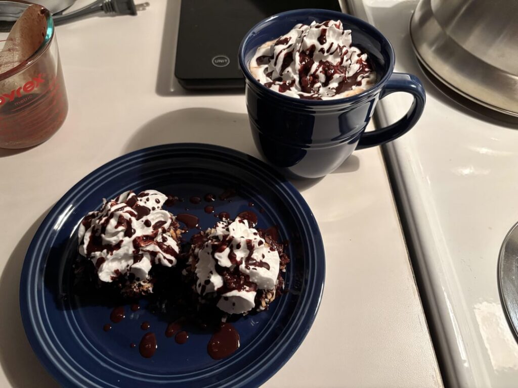Vegan cookies w/ masala hot cocoa fusion topped with cocowhip and homemade chocolate syrup