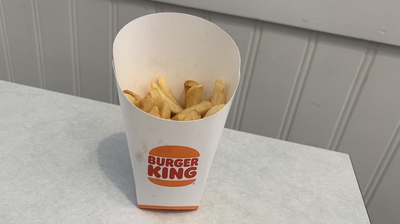 The fries from Burger King, medium-sized, golden and crunchy-looking