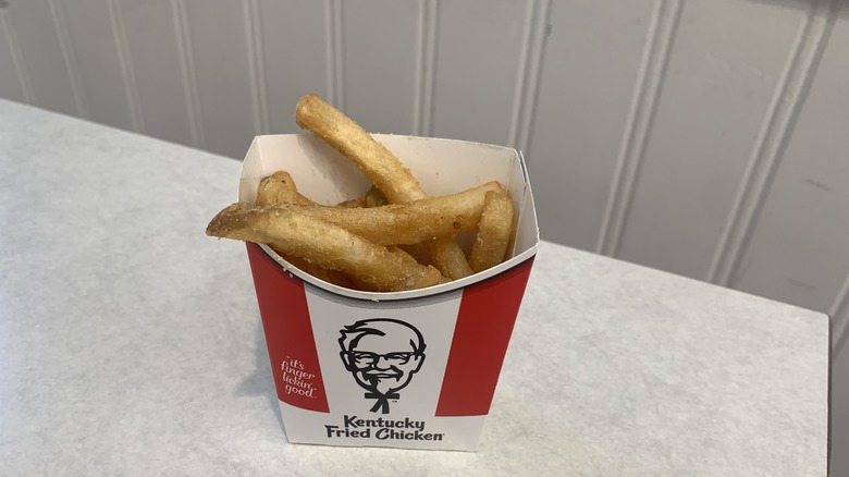 KFC's fries, long and dark, with an obvious crust