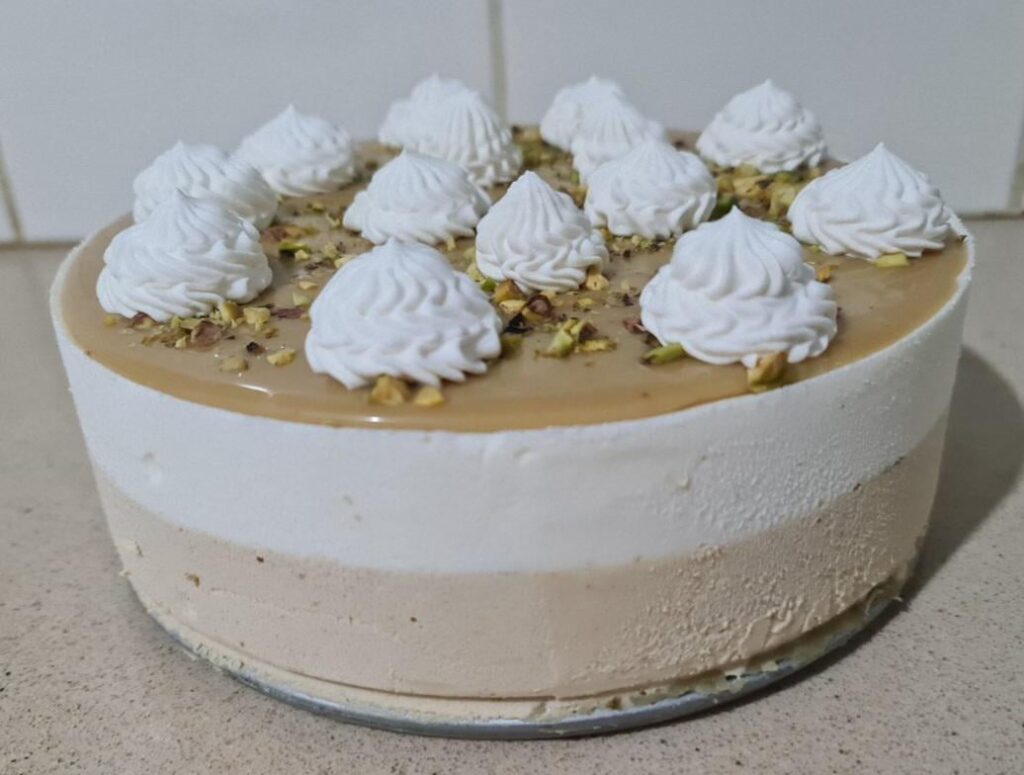 New Pistachio Mousse cake with White Chocolate Layers.