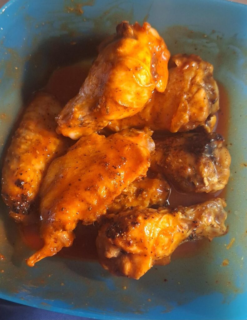 Lemon pepper + cajun seasoning tossed in Frank's 🍻