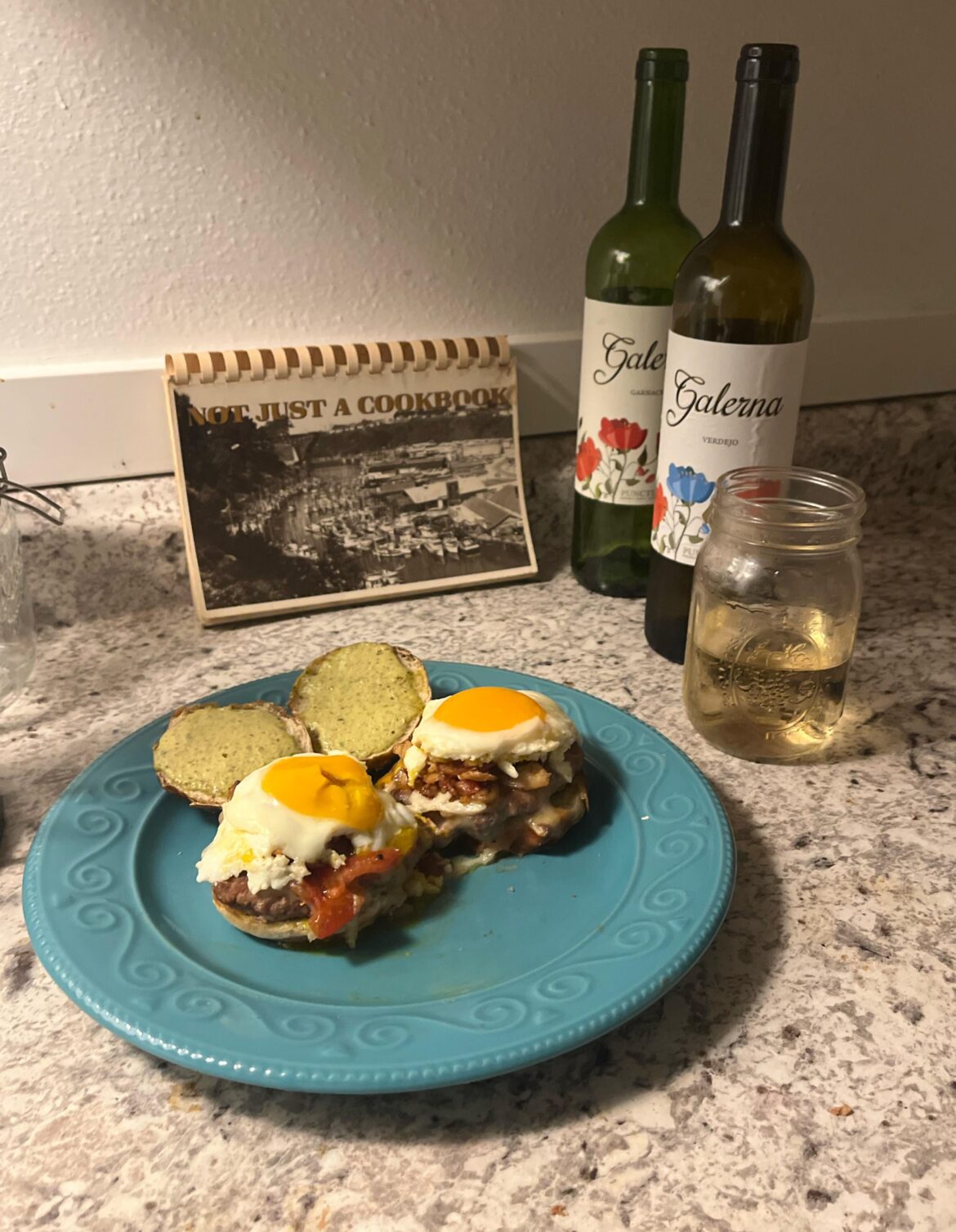 Pretzel bun, sausage, egg, and cheese slider.