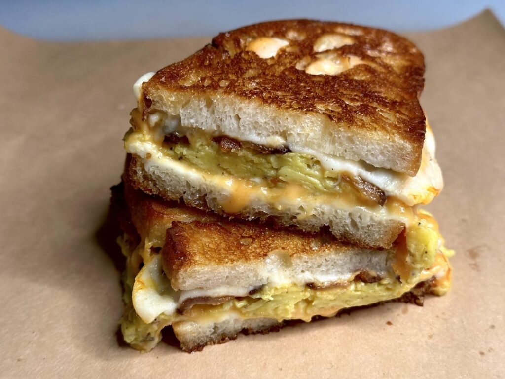 Grilled bacon, egg, and cheese breakfast sandwich