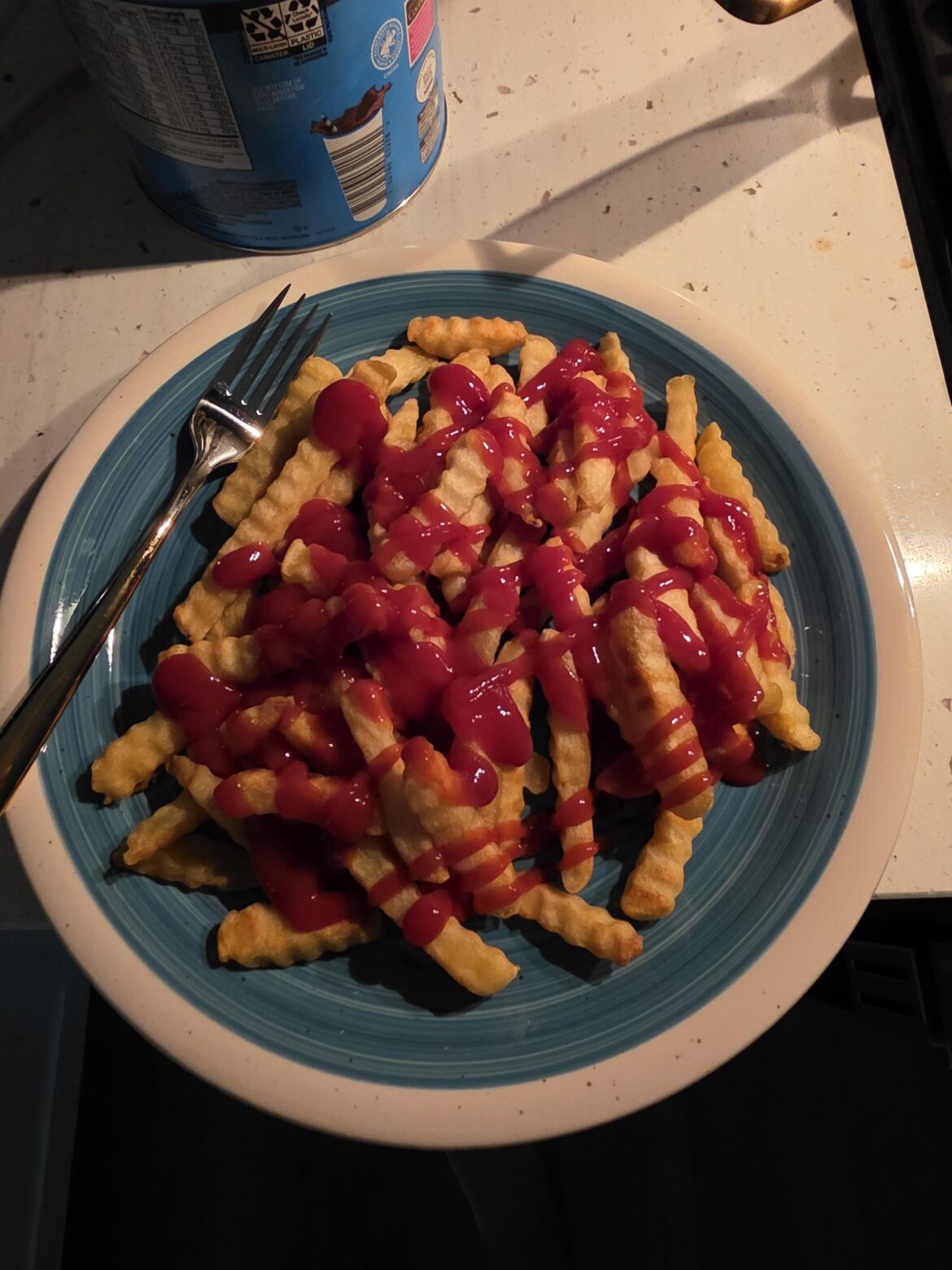 The correct way to eat french fries with ketchup