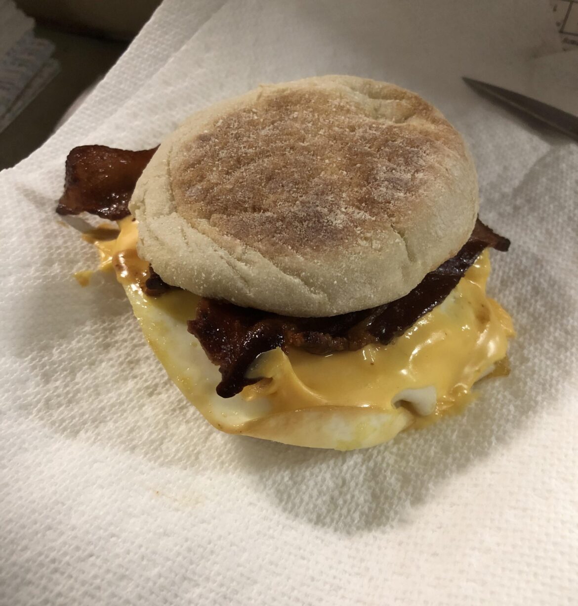 My friend gave me some homemade bacon, so I made a breakfast sandwich with it.