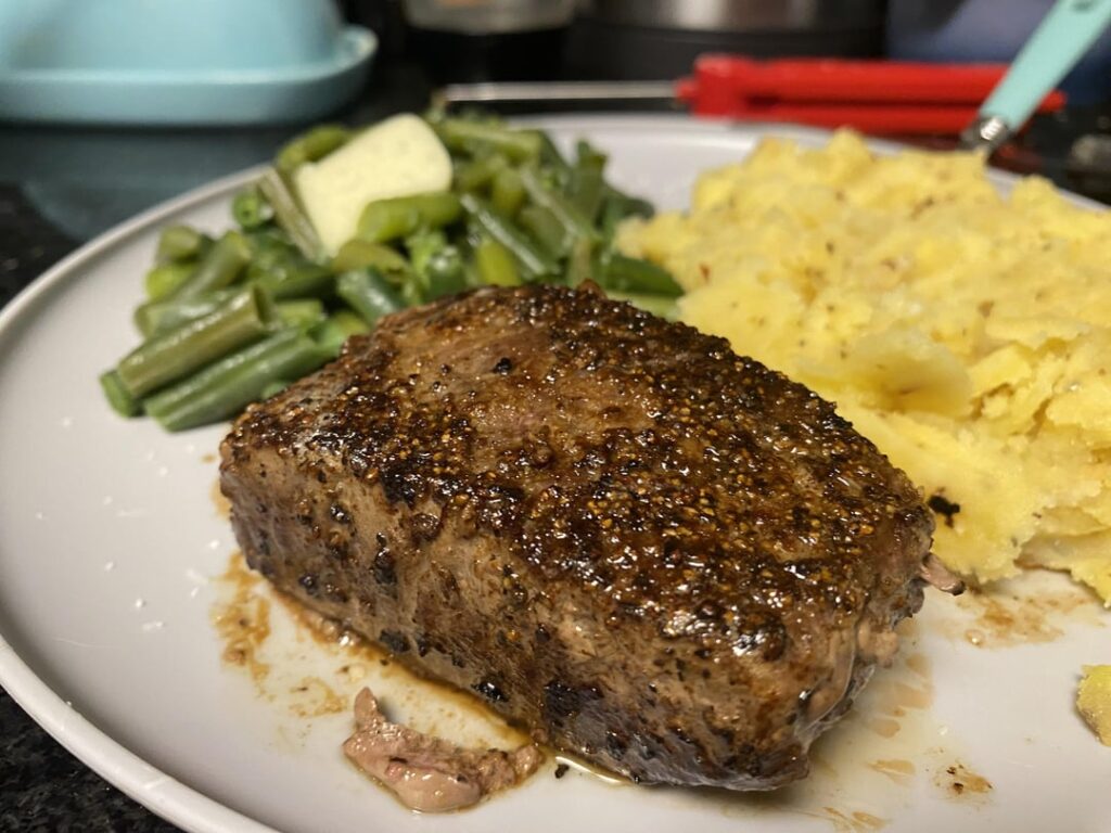 After lurking for a few weeks, I cooked my first real steak with tips I learned here.
