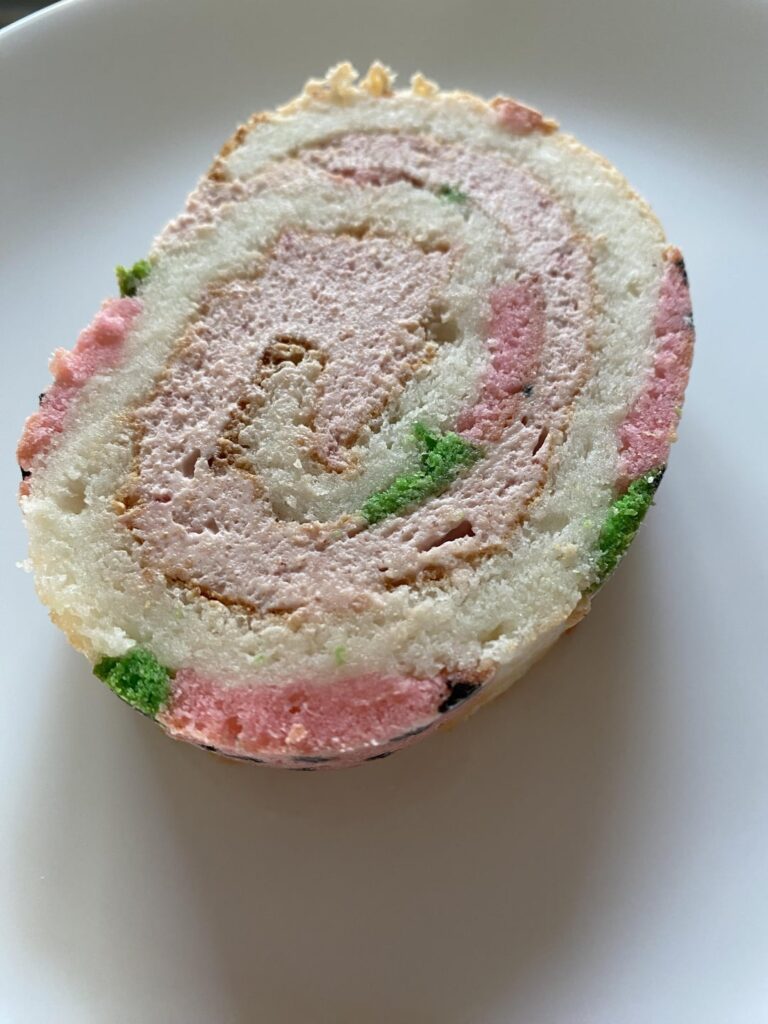 I made an Angel food/Swiss roll hybrid! (My first rolled cake ever!)